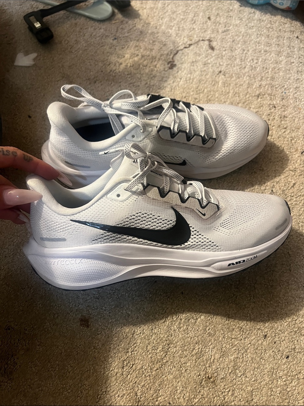 Nike White Running Shoes with Black Swoosh